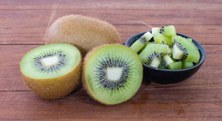 kiwi fruit isolated on wood background