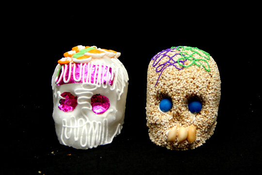 Candy in the shape of a skull made of sugar and amaranth to decorate the offering with candles for the Day of the Faithful Dead and all the saints that is celebrated in Mexico
