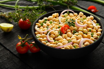 Bowl of fresh organic chickpeas salad.