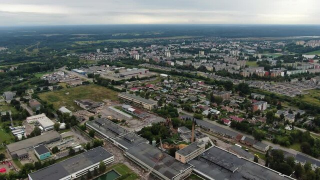 Old factories and apartment buildings of Jonava city, aerial drone view