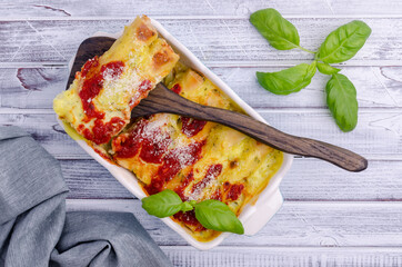 Traditional baked cannelloni with meat filling