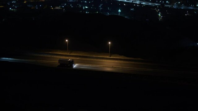 road at midnight from mountain