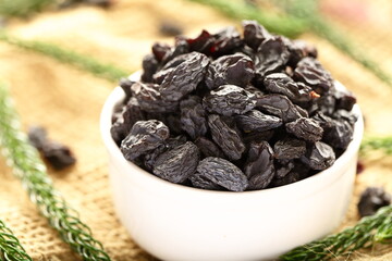Sun dried black raisins. healthy vegan diet snack foods.