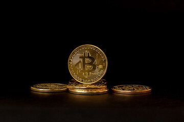Some Bitcoins that have a gold color are currently popular and have an increasing value compared to the US Dollar. For payment, finance, investment and economy concepts
