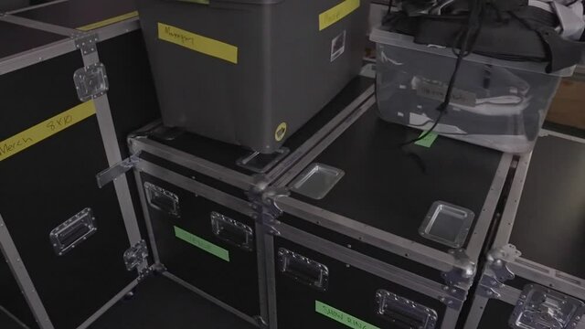 This panning video shows stacks of studio concert event travel roadie cases.