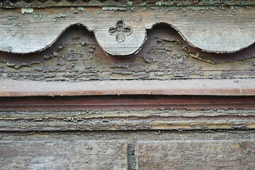 Old carved grunge stained wooden background 