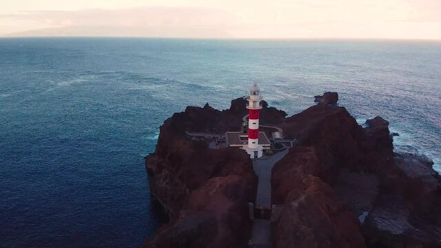 La punta de Teno lighthouse at sunset with the Atlantic in the background