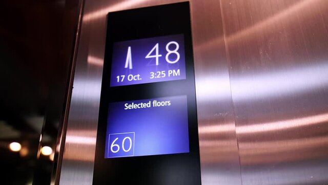 Floor number display in the elevator moving upstairs.