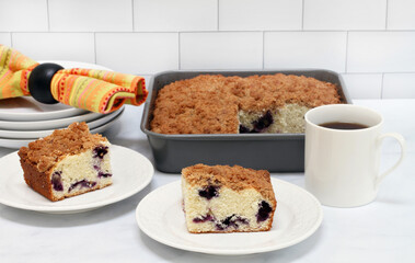 Two slices of blueberry coffee cake