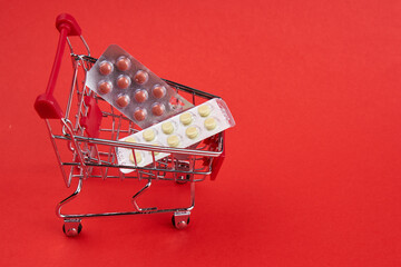 small trolley with medicines pharmacy shop pills shopping