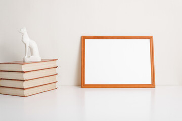 Horizontal photo frame mock-up with empty space for branding or text. Wooden white blank picture...