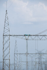 Fototapeta premium Industrial Power Lines and High Voltage Lines Electricity. High quality photo