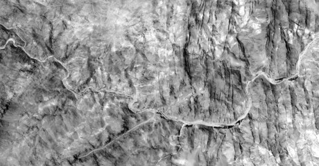   abstract photography of the deserts of Africa from the air in black and white, aerial view of...