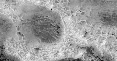   abstract photography of the deserts of Africa from the air in black and white, aerial view of...