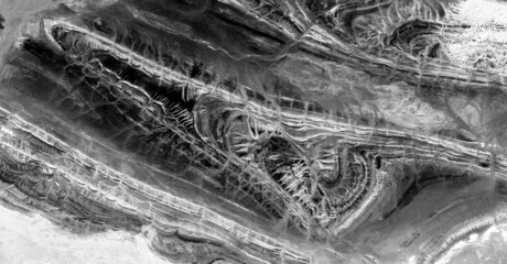   abstract photography of the deserts of Africa from the air in black and white, aerial view of...