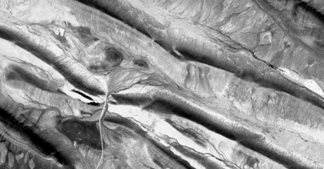   abstract photography of the deserts of Africa from the air in black and white, aerial view of...