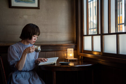 Woman in Japanese style Cafe