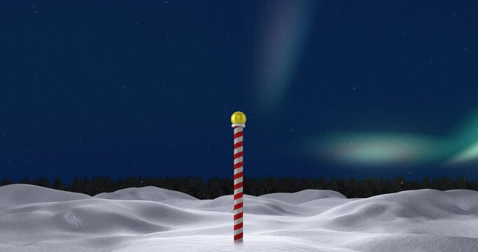 Animation of winter scenery with north pole at christmas over aurora