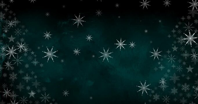 Animation of snow falling at christmas over winter scenery