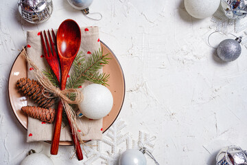 Christmas table setting. Winter table set for Christmas or New Year dinner with copy space.