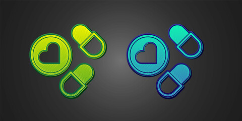 Green and blue Medicine pill or tablet icon isolated on black background. Capsule pill and drug sign. Pharmacy design. Vector