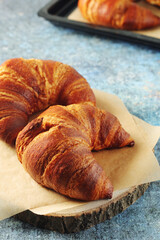 Freshly baked croissants on the table	