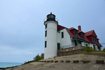 the picturesque point bestie lighthouse at the southern entrance to the manitou passage  on the northeast shore of lake michigan, near frankfort, michigan