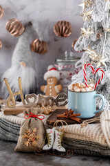 Obraz na płótnie Canvas Gingerbread with mug of hot chocolate and candy cane.