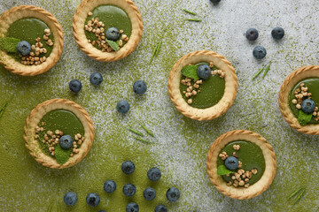 Green tea Tart with blueberries and grains