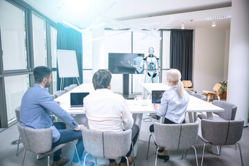 Business meeting with a humanoid robot