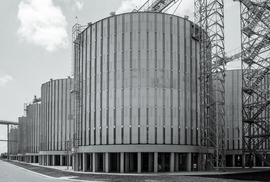Modern metal elevator for the storage and processing of grain, silage and maize used in agriculture in black and white © Konstantin