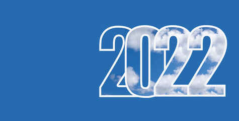 Happy New Year 2022. Numbers 2022 with texture of white cloud on an isolated blue background. Concept of welcome to new year