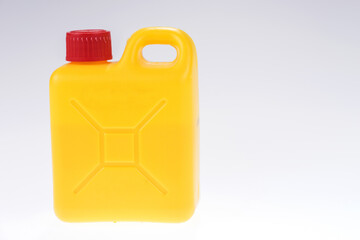 Yellow plastic canister for liquids isolated