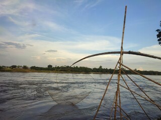 Fototapeta premium Indian fishing technique with bamboo structure in the river.