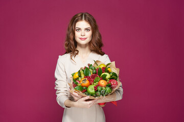 portrait of a woman smile posing fresh fruits bouquet emotions isolated background