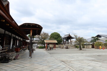 Temples and Shrines in Kyoto in Japan日本の京都にある神社仏閣 : Sho-ro Belfry and Kyo-zo Scripture House taken in the view from Daishi-do Hall in the precincts of To-ji Temple 　東寺の境内の大師堂からの鐘楼と経蔵の眺め