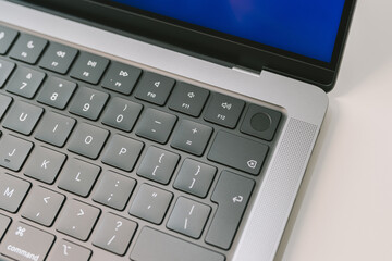 Closeup view of Touch ID button on the new Apple MacBook Pro 2021