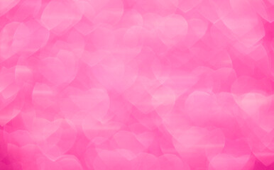 Background bokeh in the form of hearts of red and pink color. Copy space for text. The concept of romance and love. Valentine's Day. Shiny texture background. Festive background.