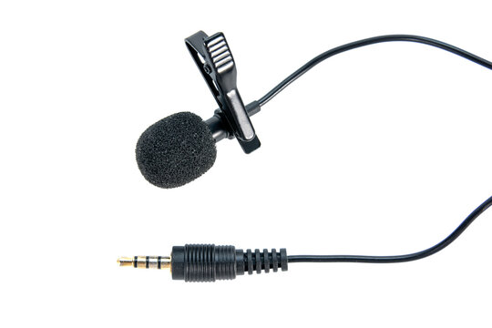 Wireless microphone clip with mini 3.5 jack audio isolated on white background. Black small microphone lapel or lavalier isolated