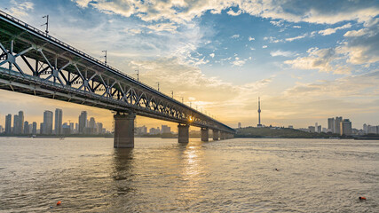 Fototapeta na wymiar Sunset view from the first steel bridge of Wuhan above Yangtze river