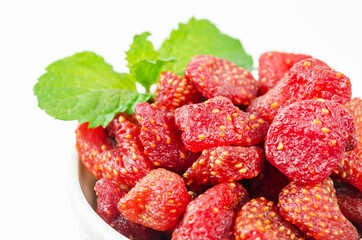 Close-up dried sweet strawberries in cup.