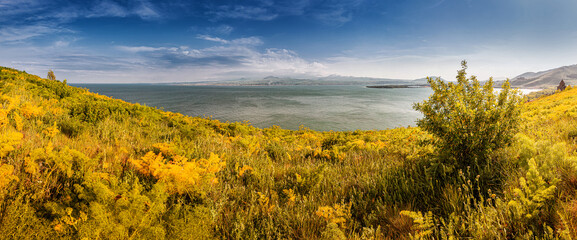 Dramatic panoramic view on Lake Sevan at autumn. Natural travel destinations in Armenia