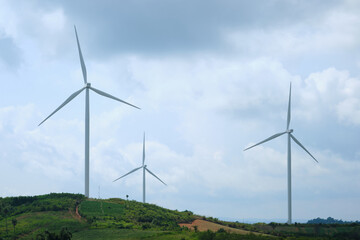 View of a windmill or Wind turbine farm . Renewable energy source. Electricity production .