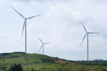 View of a windmill or Wind turbine farm . Renewable energy source. Electricity production .
