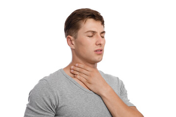 Upset handsome young european guy suffering from sore throat, feeling unwell, isolated on white...