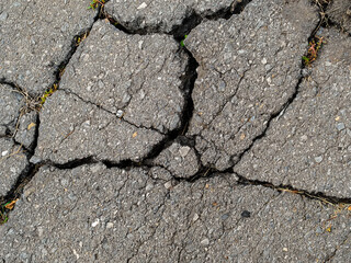 Obraz premium cracked gray asphalt close up
