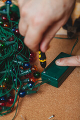 New Years is soon. Repair of  Christmas tree electric garland