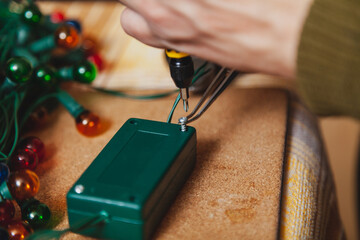 New Years is soon. Repair of  Christmas tree electric garland