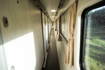 Narrow corridor in front of the room inside the first class train