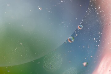 Oil bubbles in water. Macro shot.
Abstraction- universe, galaxy, planets